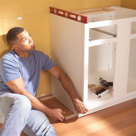 installing cabinets on stud walls